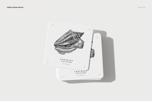 Square coasters mockup featuring a black and white seashell design and text, displayed on a plain surface.