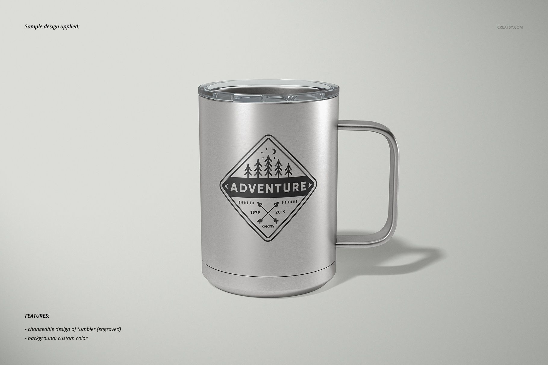 Stainless steel camp coffee mug with a handle, featuring a geometric adventure logo, shown in front view on a light background.