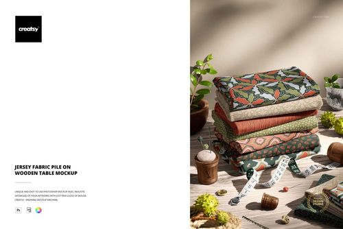 Assorted jersey fabric layers with colorful patterns arranged on a wooden surface, shown in a realistic mockup scene.