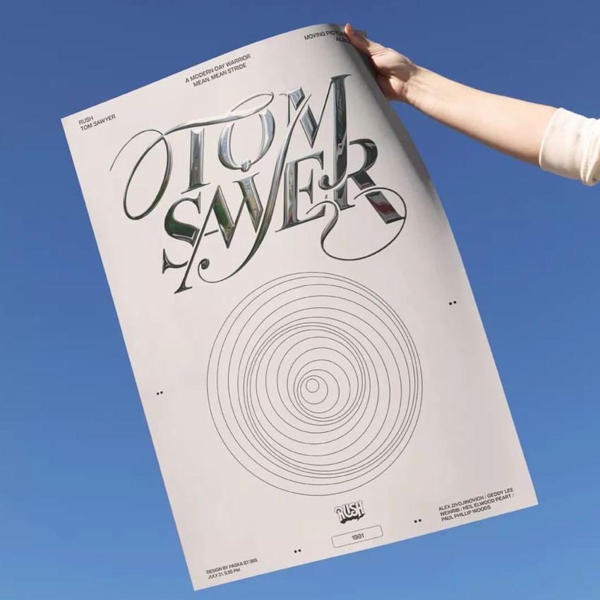 Hand holding a poster mockup against a clear blue sky, featuring large stylized text and concentric circle target design.