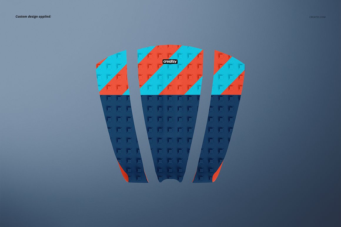 Three-piece surfboard traction pad mockup with geometric blue and red pattern on a gray background, top perspective.