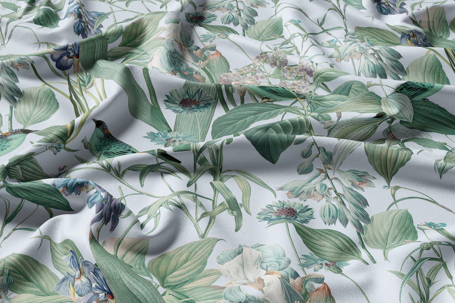 Detailed curtain fabric mockup showing a floral and leafy design in soft green and blue tones, slightly wrinkled surface.