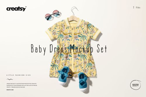 Front view of a baby dress mockup with a yellow pattern, paired with blue shoes and sunglasses on a light background.