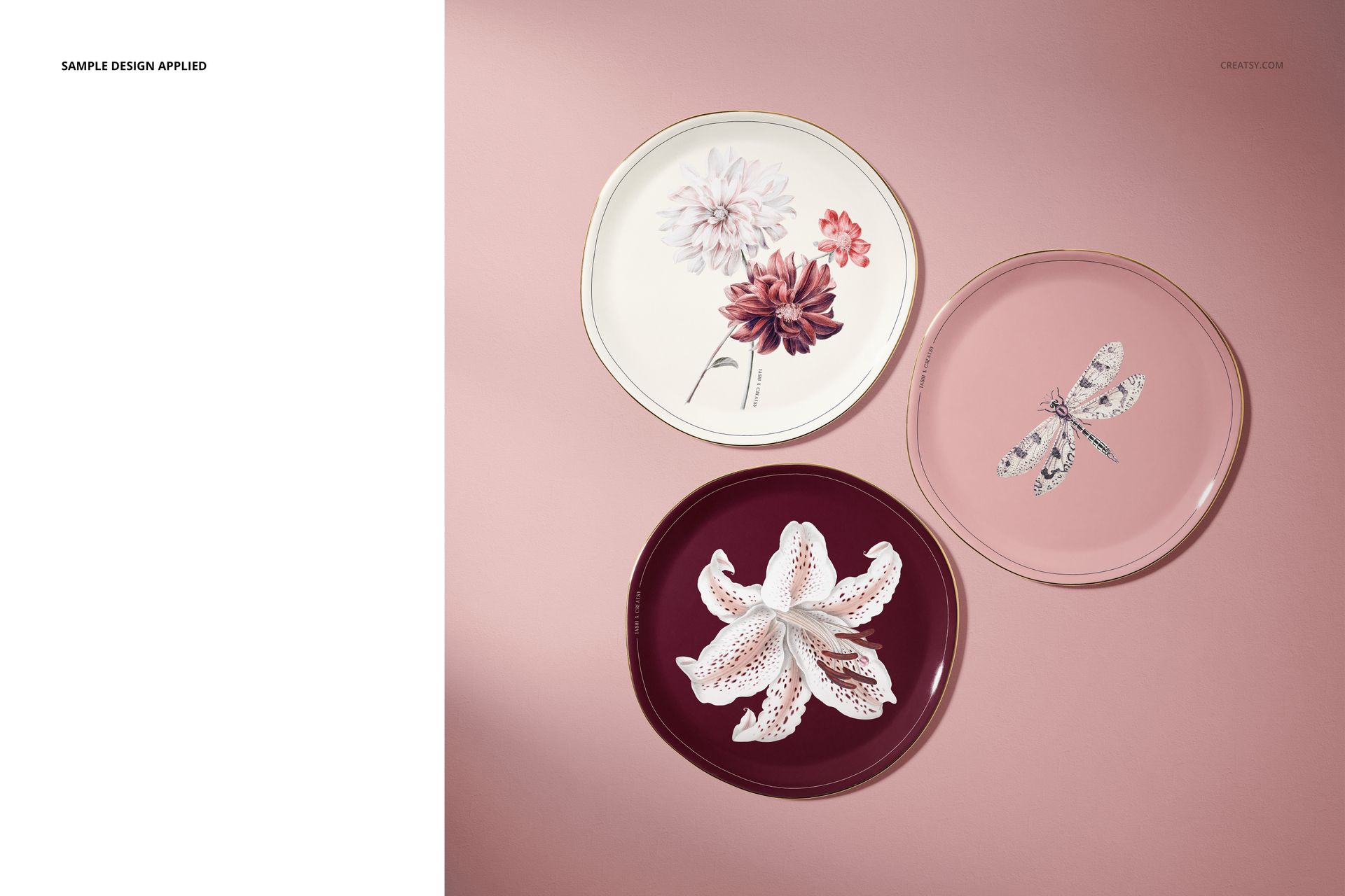 PSD mockup of plates with botanical and dragonfly artwork, viewed from above on a soft pink tabletop.