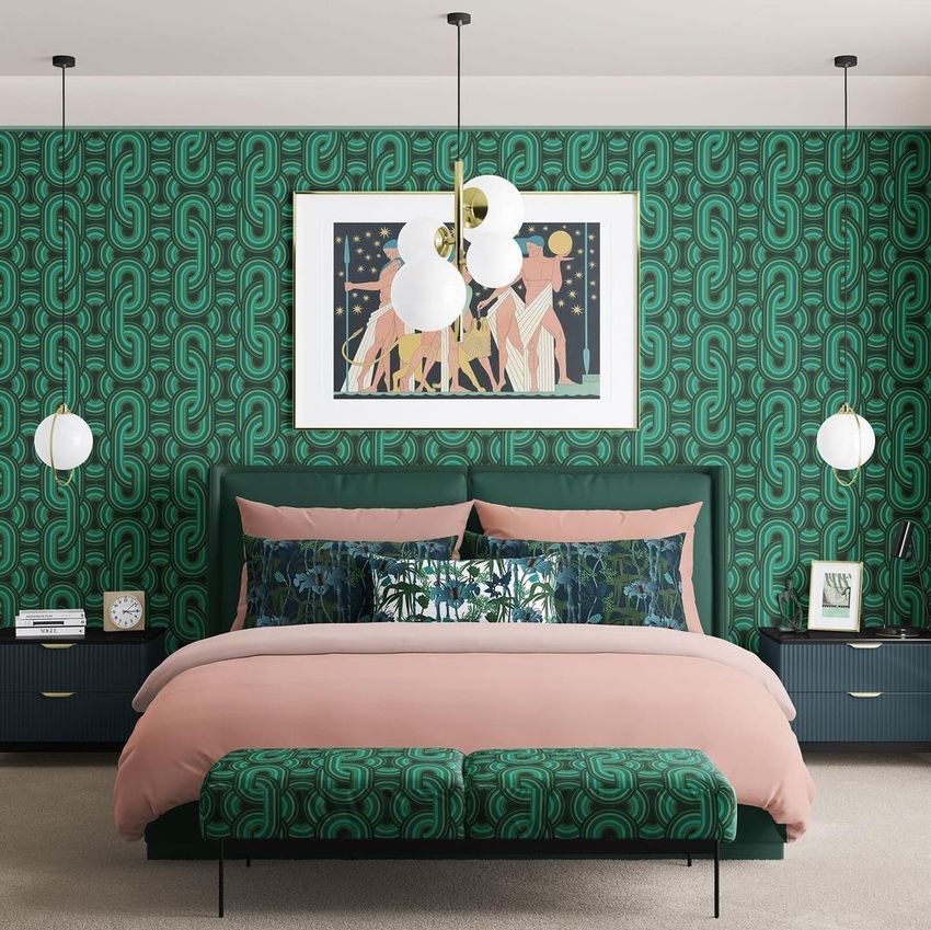 Bedroom scene bedding mockup showing a bed with green and pink bedding, geometric wallpaper, and modern pendant lights.
