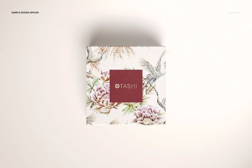 Rectangular jewelry box mockup with botanical and bird illustrations, viewed from above against a plain backdrop.