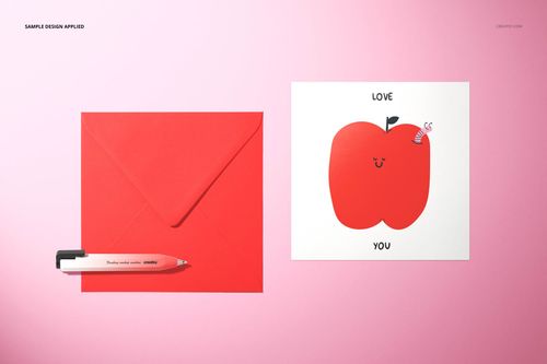 PSD mockup showing a red envelope, white pen, and illustrated valentines card with 'Love You' text on pink backdrop.