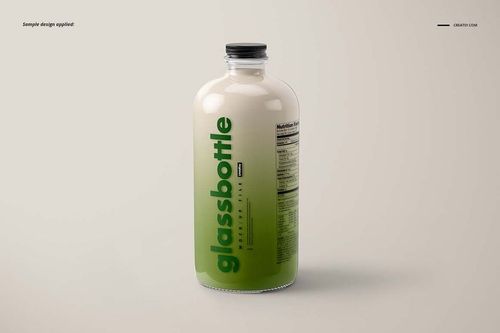 Glass bottle mockup featuring a transparent container with green contents and vertical green lettering, seen from the front.