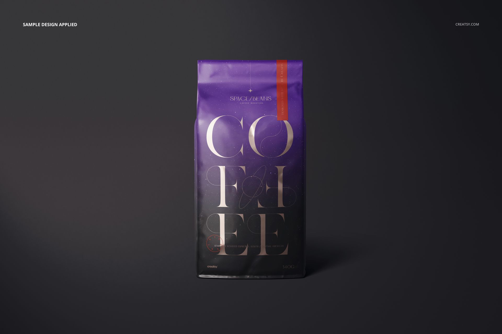 Glossy coffee bag mockup standing upright on a dark surface, featuring a purple design with bold lettering.