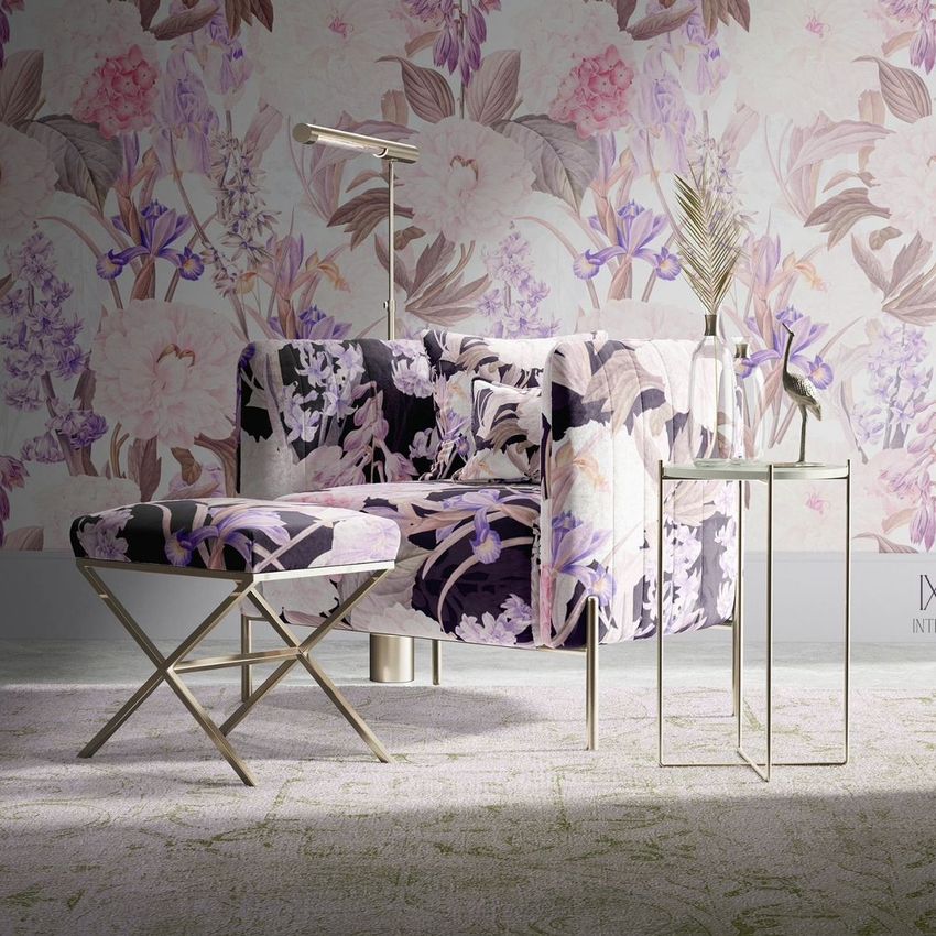 Velvet armchair and matching stool mockup with floral patterns set in a modern living space with pastel wallpaper and side table.
