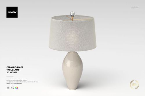 Front view of a ceramic glaze table lamp with a rounded beige base and a wide light gray fabric lampshade on a plain background.