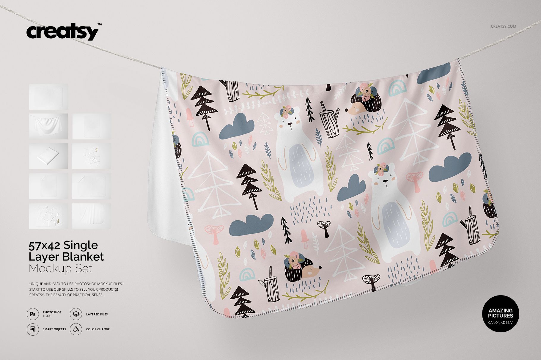 Single layer blanket with pastel animal and nature pattern hanging on a line, shown in a front view mockup scene.