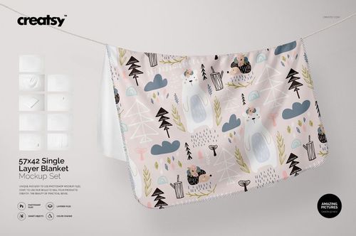 Single layer blanket with pastel animal and nature pattern hanging on a line, shown in a front view mockup scene.