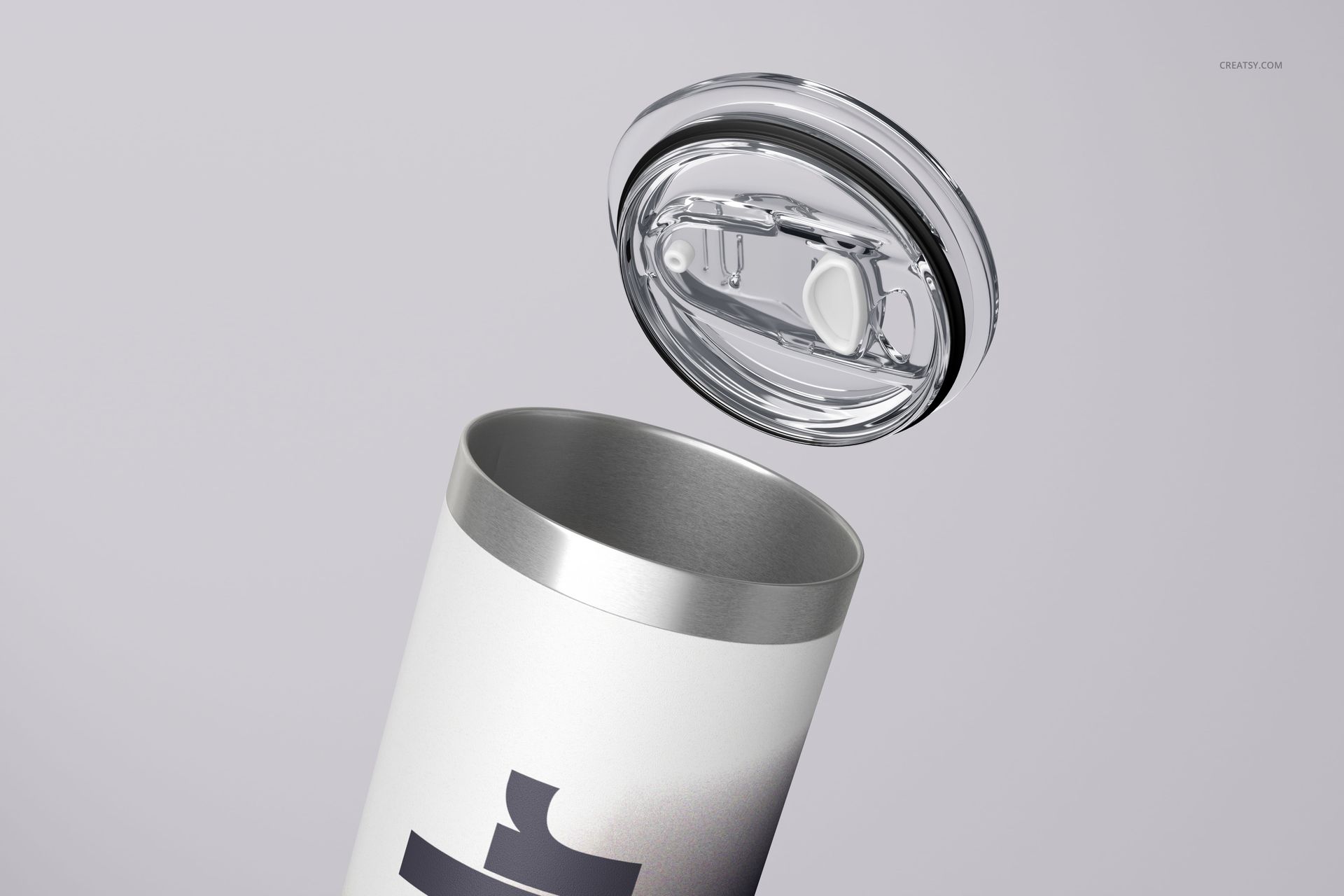 Angled close-up of a powder coated skinny tumbler with a stainless steel rim and transparent lid hovering above.