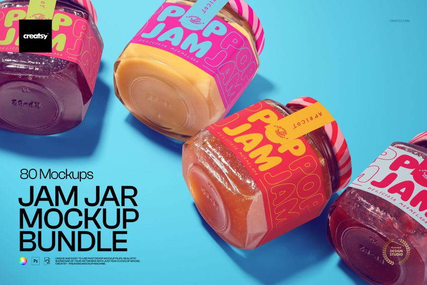 Four colorful jam jars with vibrant labels displayed on a bright blue surface, shown from an angled top view.