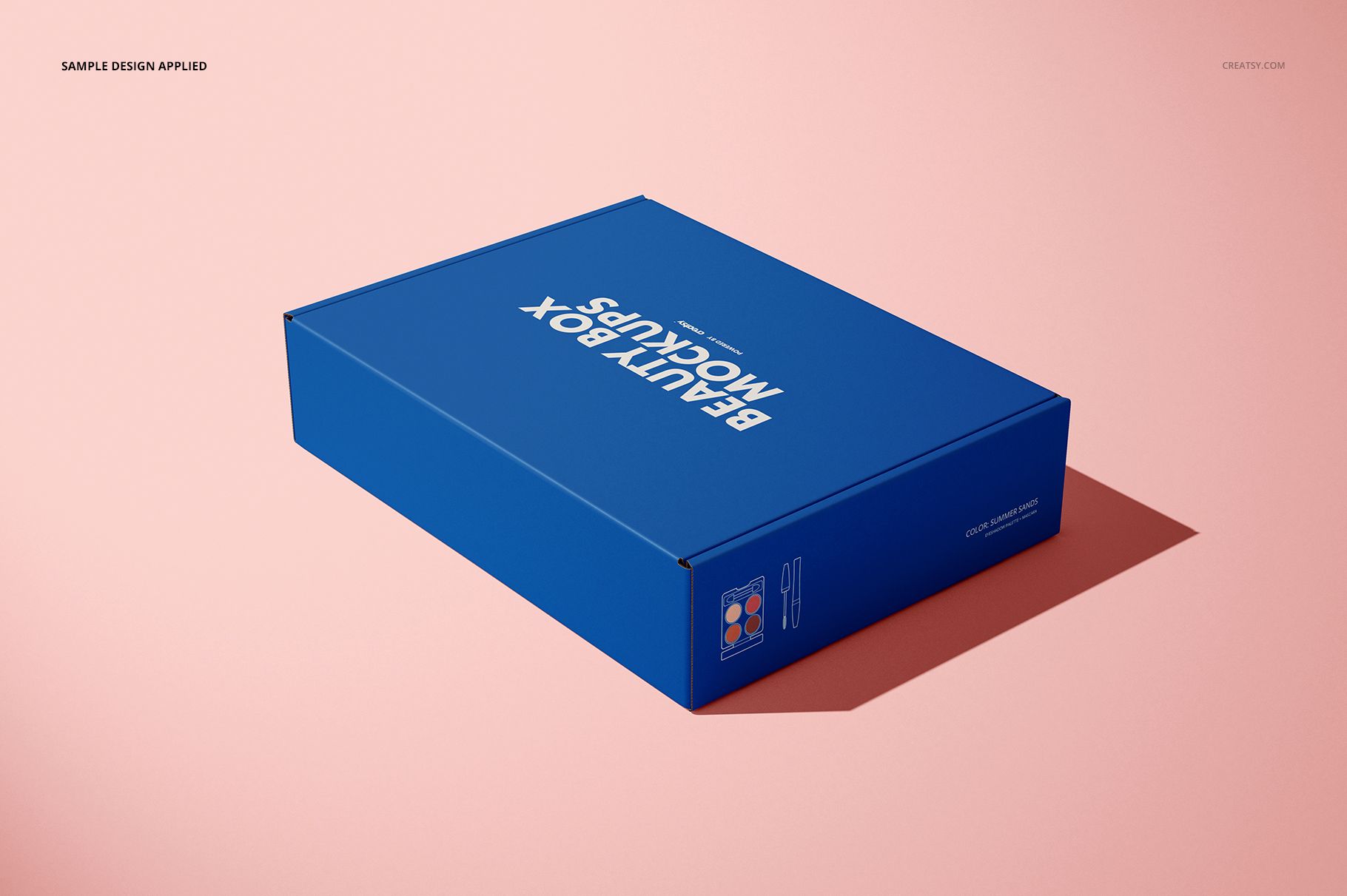 Rectangular mailing box mockup in solid blue color, shown from a front angle on a light pink background.