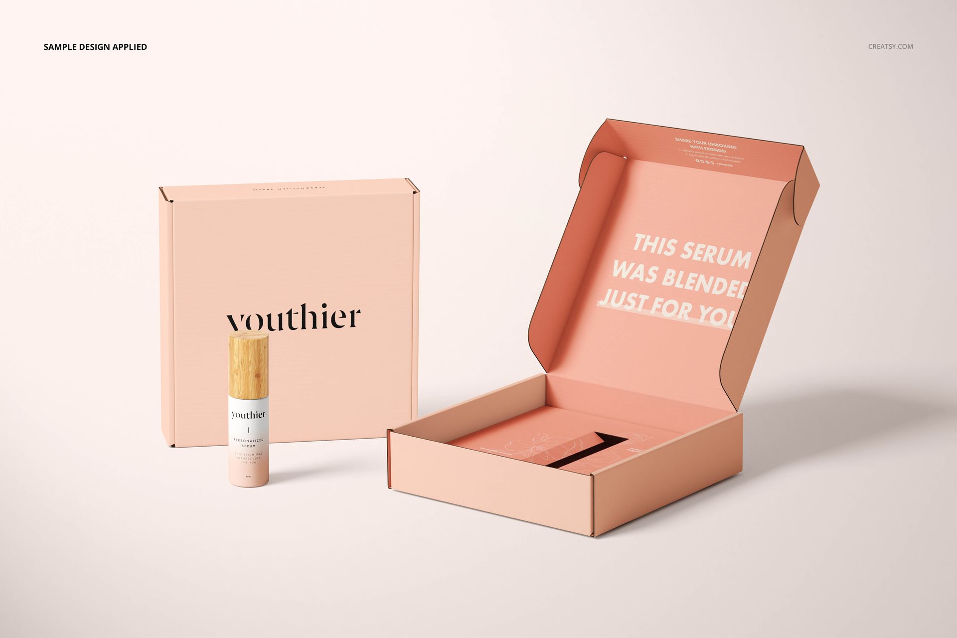 Cosmetic mailing box mockup set with a closed box, an open box displaying interior text, and a small bottle on a light background.