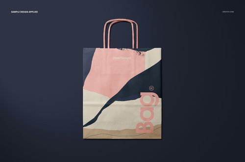 Twisted handles paper bag mockup featuring a modern, abstract pattern in pink, navy, and beige colors.