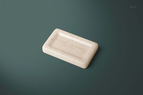 Minimalist PSD mockup of a rectangular hand soap, featuring a light speckled texture and clean green backdrop.