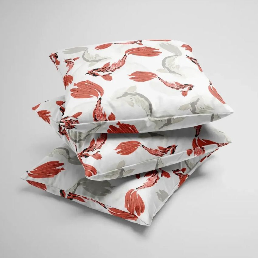 Velvet cushion cover mockup showing three stacked pillows with a red and gray koi fish pattern on a plain light background.