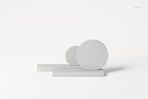 Abstract table decoration featuring two round geometric shapes on rectangular bases, shown from a front angle on a white background.