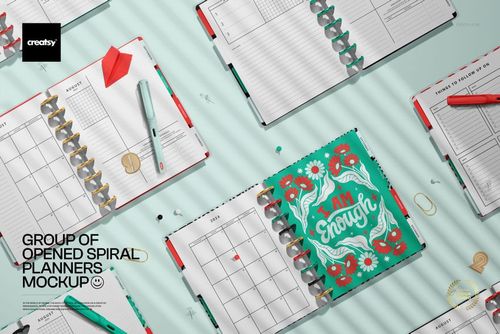 Flat lay of spiral planners mockup with open pages, decorative covers, pens, and paper clips on a mint background.
