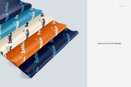 Colorful wrapping tissue paper mockup bundle displayed in overlapping layers with sample designs, top angle view.