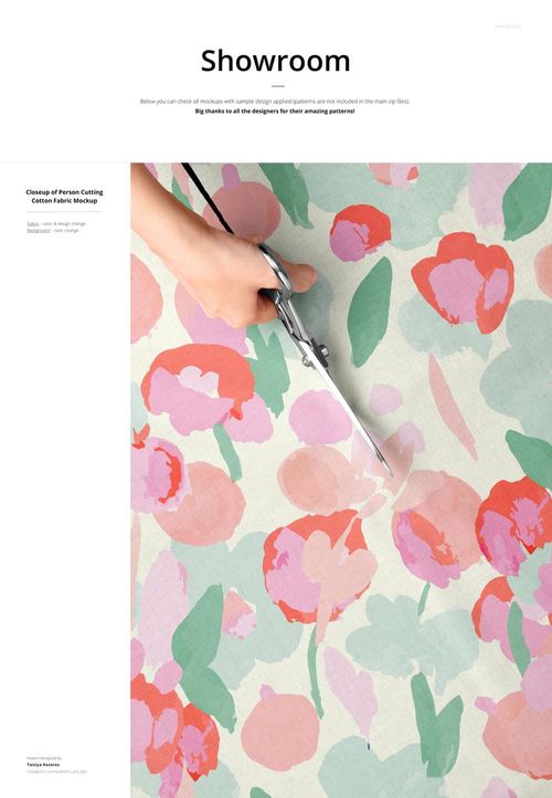 Top view of a hand using scissors to cut cotton fabric with a colorful floral pattern, shown in a mockup scene.