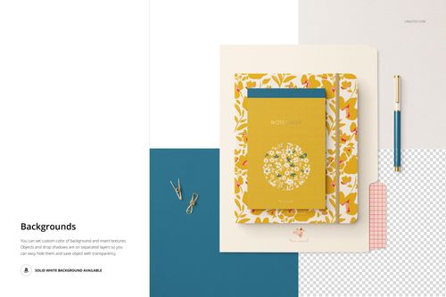 Top view of a stationery set mockup with floral notebooks, a blue sheet, gold pen, and paper clips on a white background.
