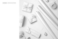 Wrapping papers and gifts mockup with various shapes, ribbons, a gift tag, and paper Christmas decorations in neutral tones.