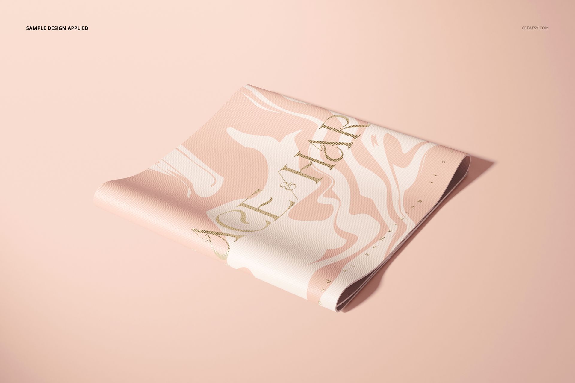 Yoga mat mockup featuring a soft pink and beige swirl design, shown partially rolled on a light pink background.