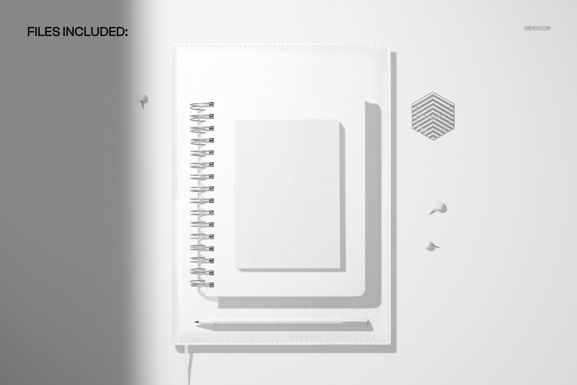 Stationery mockup featuring a spiral-bound journal, leather planner, and small notebook on a clean white background.