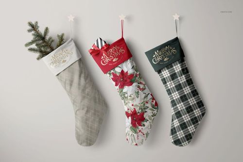 Christmas stocking PSD mockup set showing three stockings with star-shaped hangers, plaid and floral prints, and gifts.