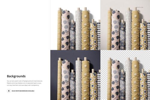 Front view of several fabric rolls in a PSD mockup, featuring assorted patterns and neutral tones on a flat surface.