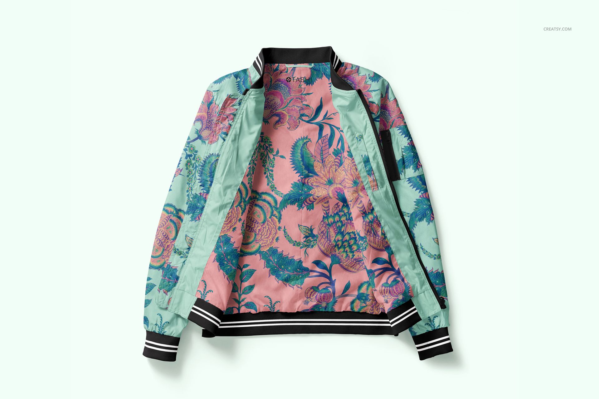 Men's bomber jacket mockup displayed open on a light background, featuring a colorful floral inner lining.