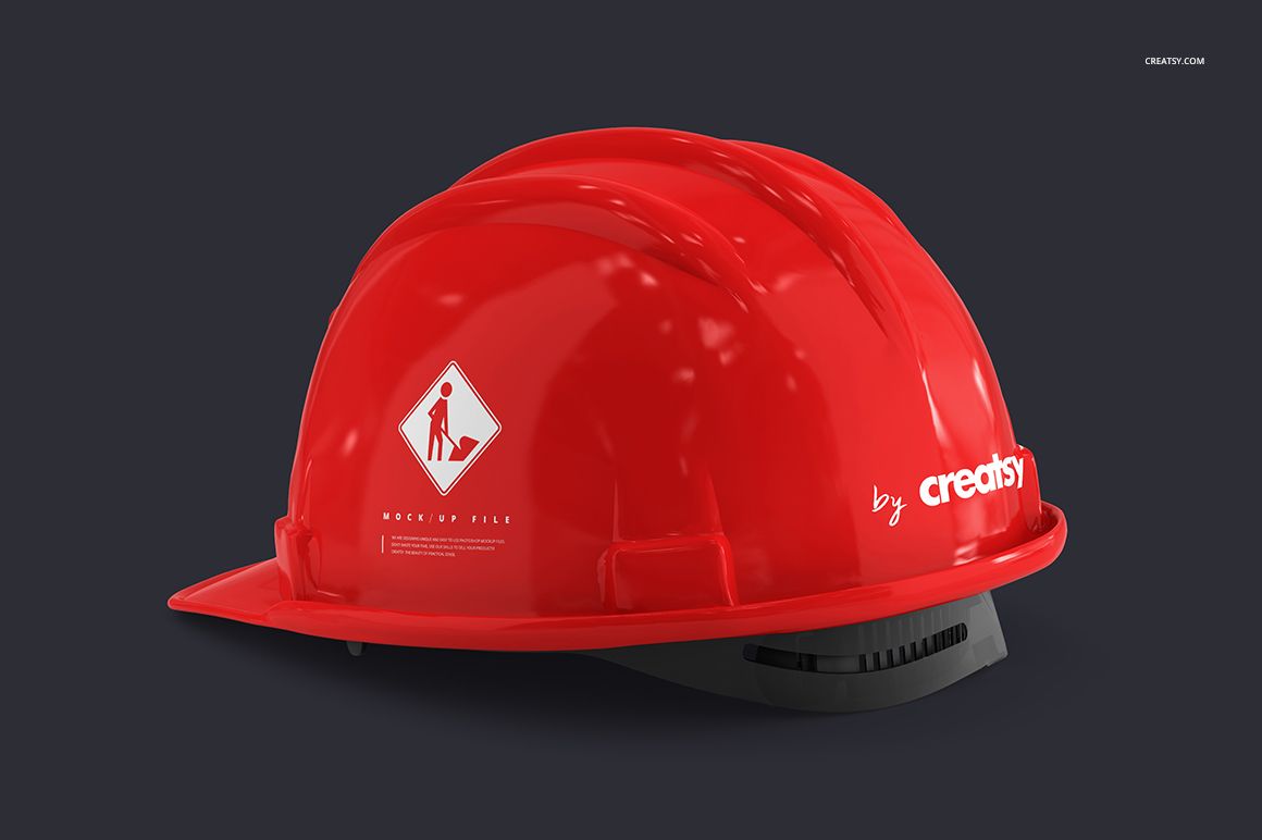 Construction hard hat mockup in bright red, displayed from a side angle with reflective highlights and a safety icon.
