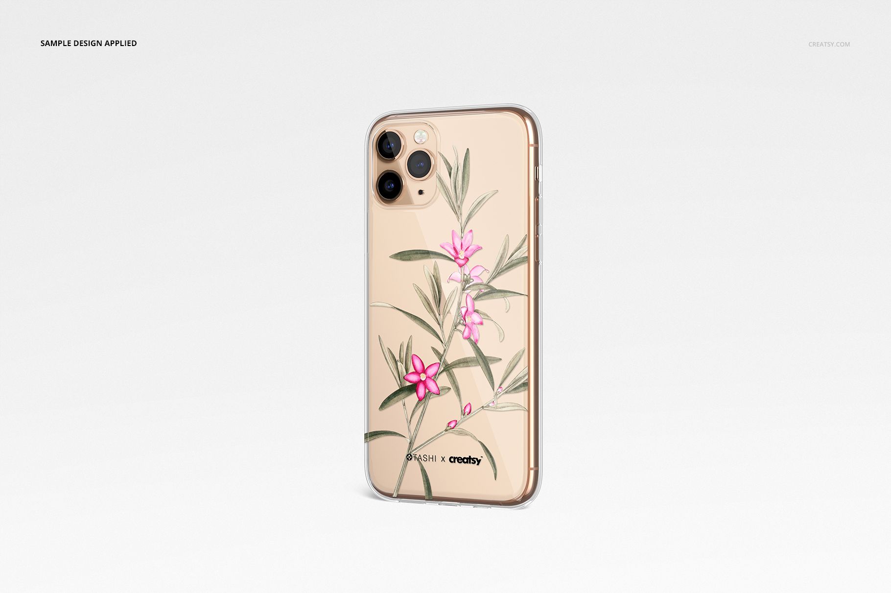 iPhone 11 Pro clear case mockup featuring delicate pink flowers and green leaves, displayed on a light backdrop.