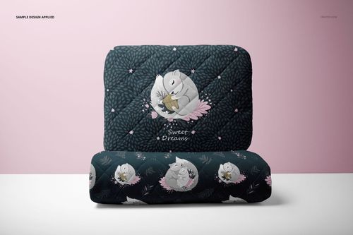 Mockup of baby pillow and quilt set with dark leafy background and illustrated animal design, displayed on a pink wall.