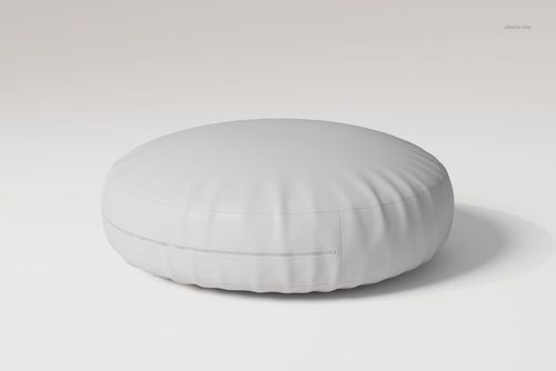 Round floor cushion in solid white color, shown from a front angle on a plain light background with soft shadows.