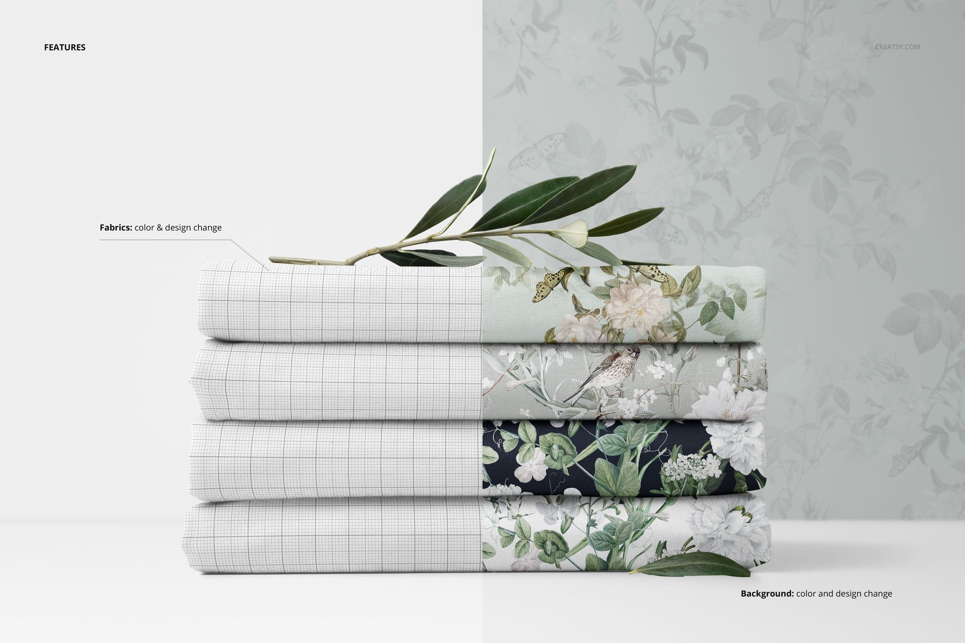 PSD mockup showing stacked jersey fabric pieces in light and dark floral patterns, olive branch placed above.