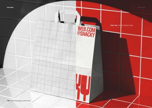 Front view of a standing paper takeaway bag mockup with grid and bold red text, set against glossy tiled walls.