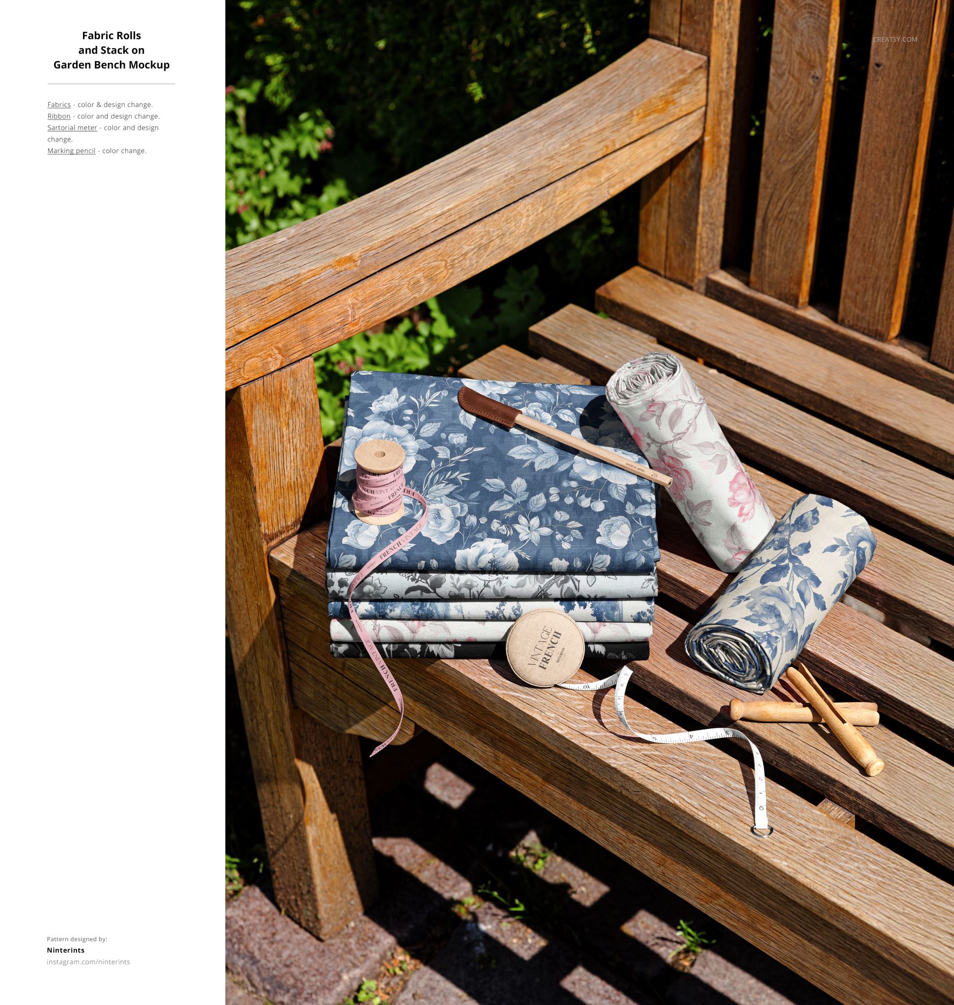 Stacked fabric rolls and folded fabrics with floral patterns placed on a wooden garden bench in sunlight outdoors.