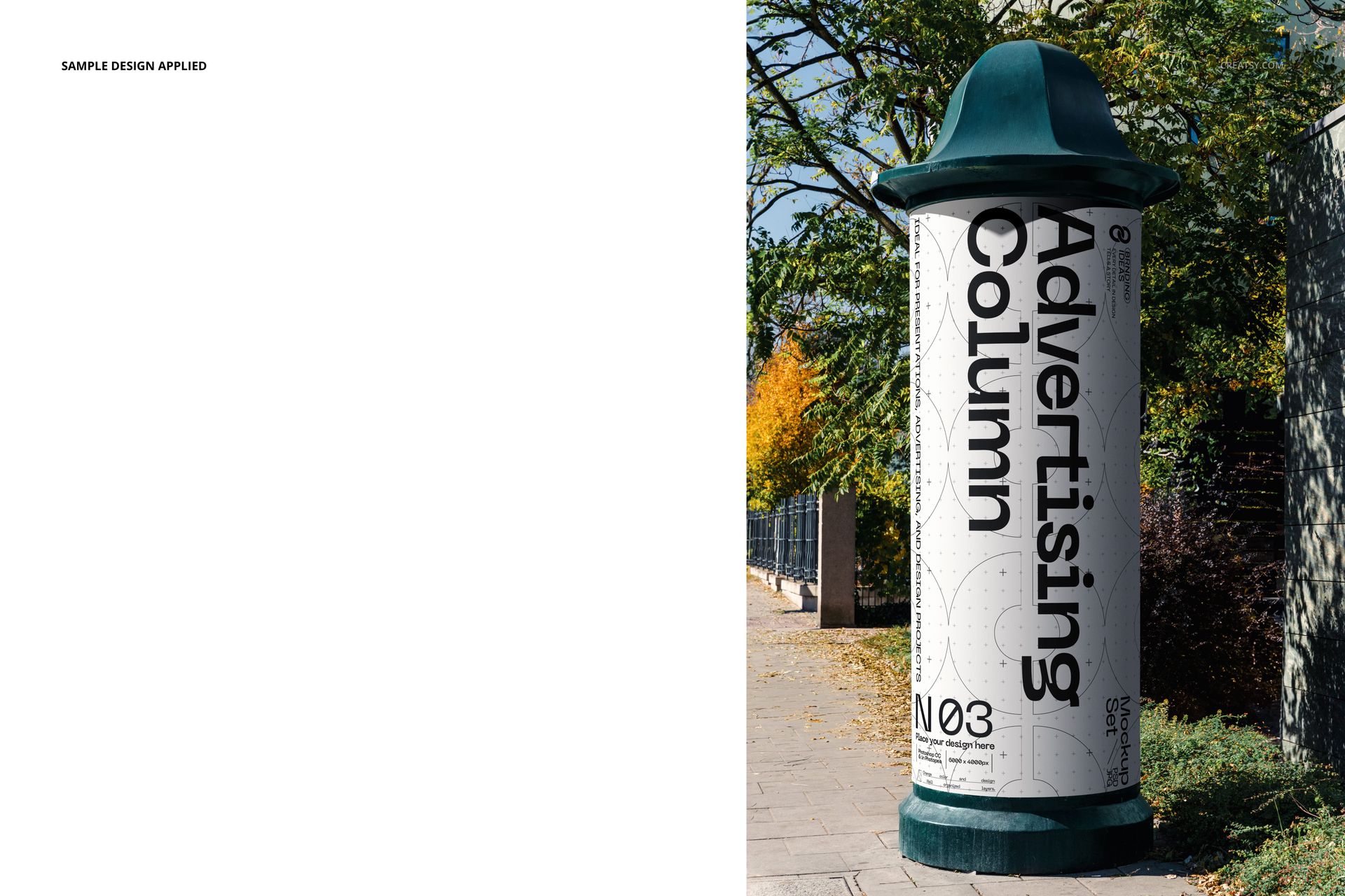 Outdoor advertising column mockup with a cylindrical shape, white surface, and bold black text, set on a sidewalk near trees.