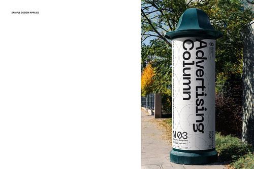 Outdoor advertising column mockup with a cylindrical shape, white surface, and bold black text, set on a sidewalk near trees.