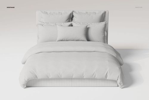 Front view of a bedding set featuring ruffled pillows and a soft comforter in light neutral tones on a bed frame.