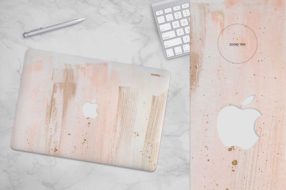 Top view of Macbook skin case mockup featuring soft pastel brushstrokes, placed beside a white keyboard and pen.