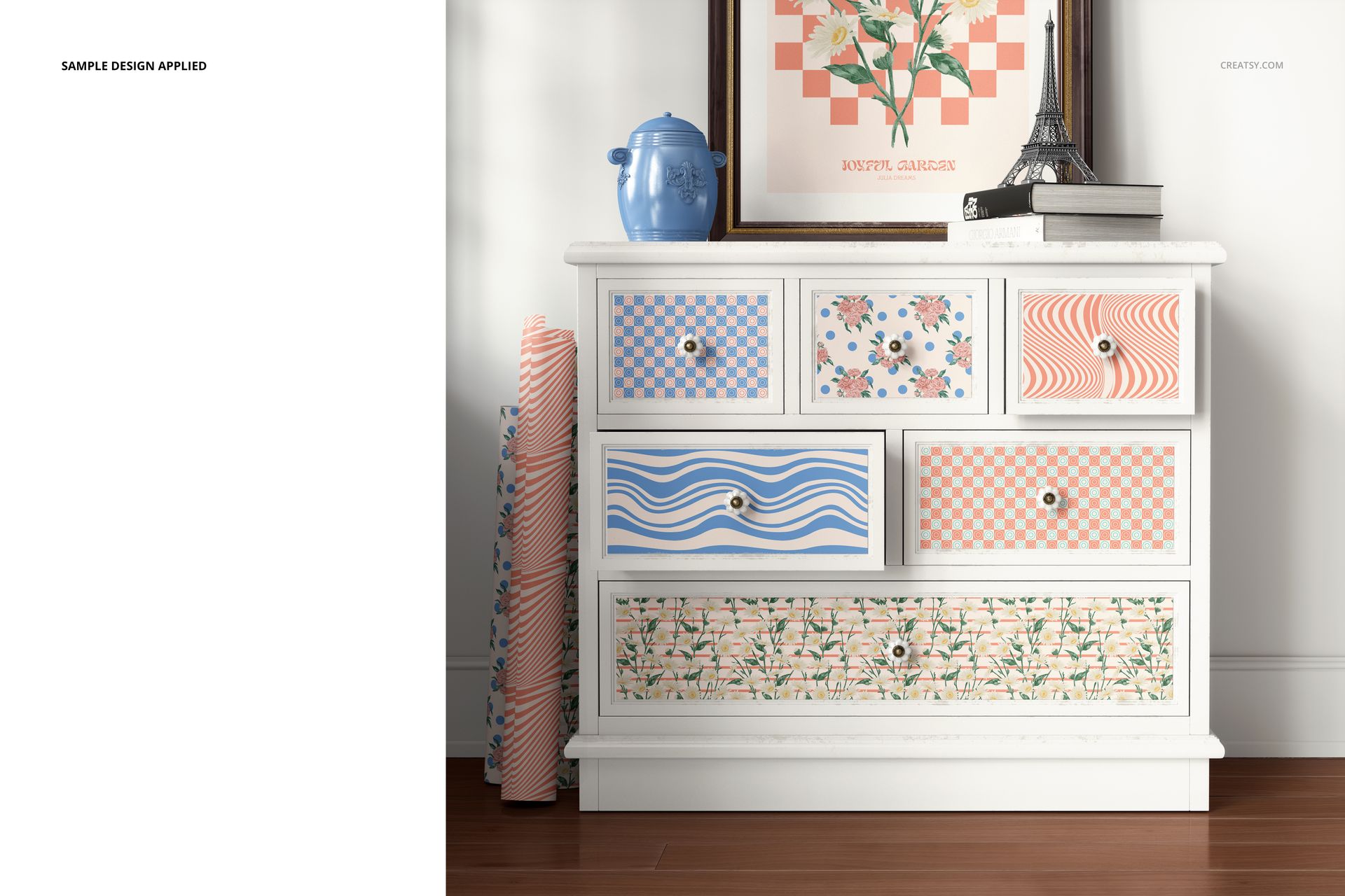 White furniture mockup with various pastel patterns on the drawers, shown in a bright room with decorative props.