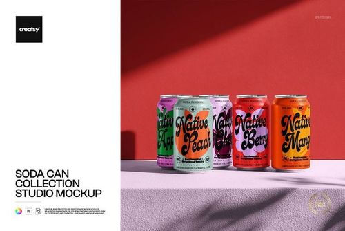 Front view of four colorful soda cans with bold text designs on a pink surface against a red wall, studio mockup.