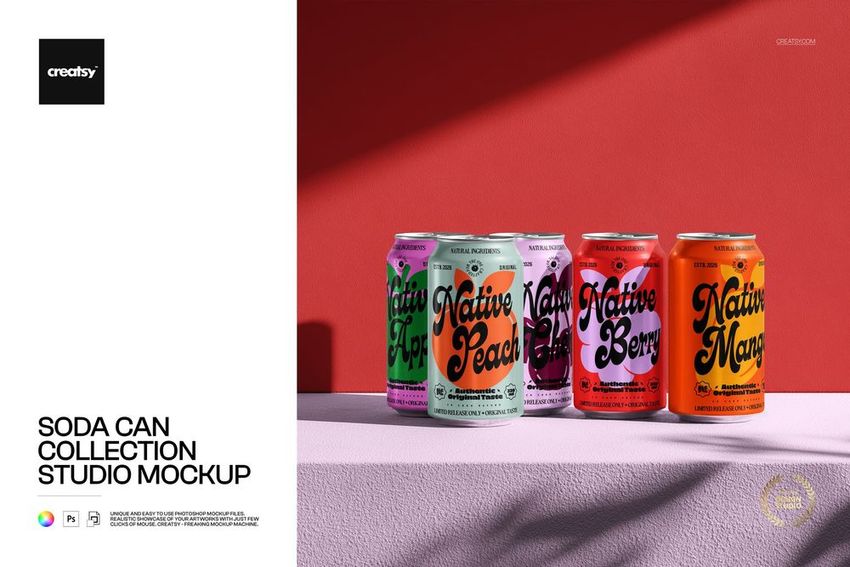 Front view of four colorful soda cans with bold text designs on a pink surface against a red wall, studio mockup.