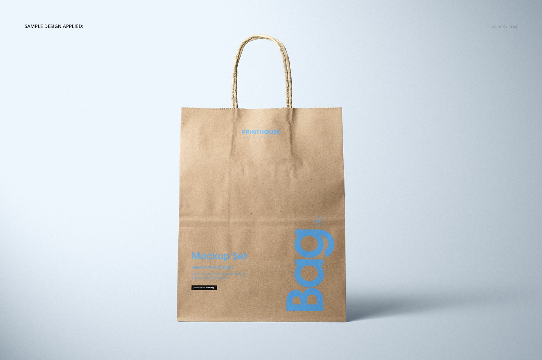 Kraft paper shopping bag mockup featuring a plain brown surface and blue printed text, shown from the front.